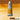 Winsor & Newton Raw Sienna Winton Oil Colour 200ml, front view of product with colour swatch as background